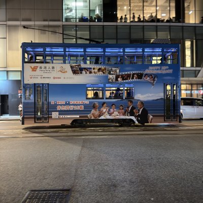 Double-Decker Dreams in Urban Light
