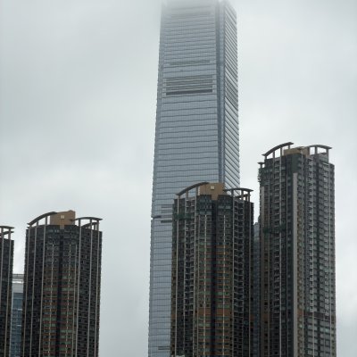 Glass Tower Pierces Gray Sky